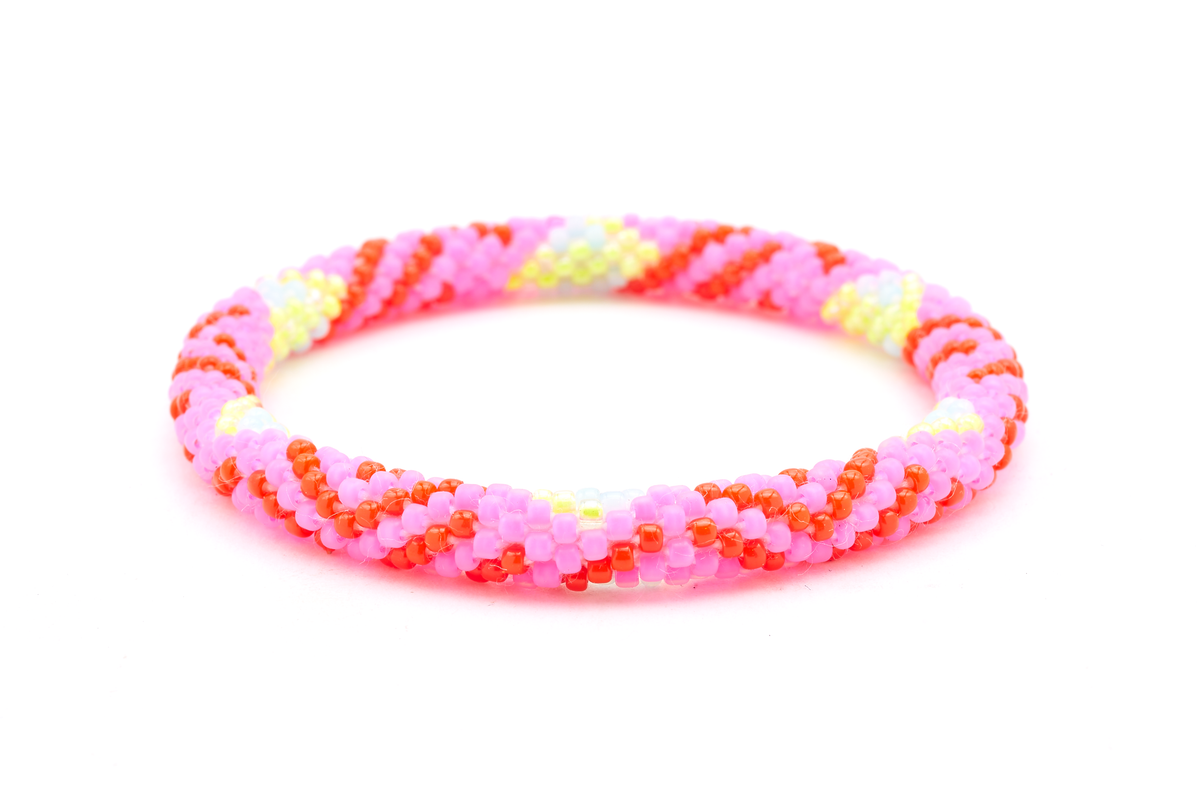 Handmade beaded friendship bracelet with matte pink, red, light blue, and neon yellow glass beads. Crafted by artisans in Nepal for Sashka Co.