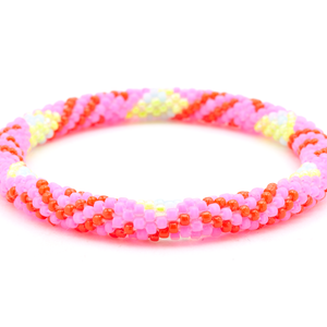 Handmade beaded friendship bracelet with matte pink, red, light blue, and neon yellow glass beads. Crafted by artisans in Nepal for Sashka Co.