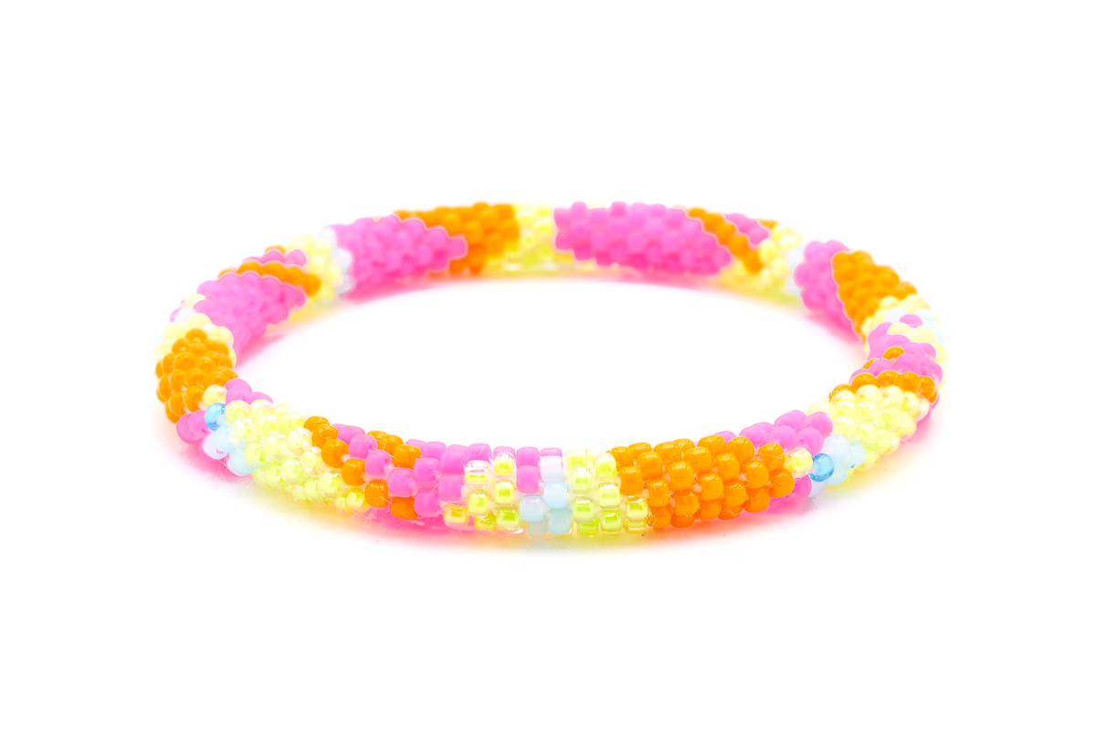 Handmade beaded friendship bracelet with orange, matte pink, yellow, and blue glass beads. Crafted by artisans in Nepal for Sashka Co.