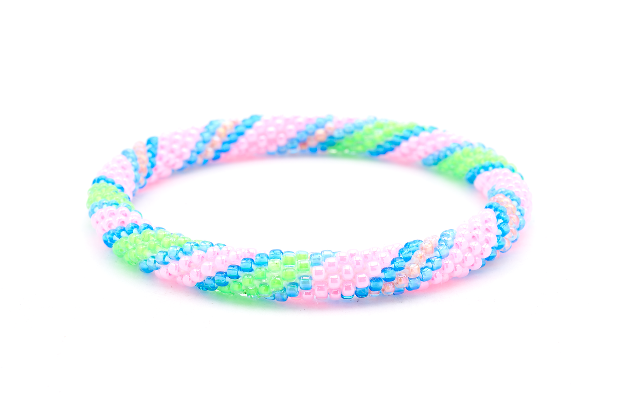 Sashka Co. Pink, Green, Blue Bracelet. Handmade glass bead bracelet from Nepal, featuring a roll design.
 