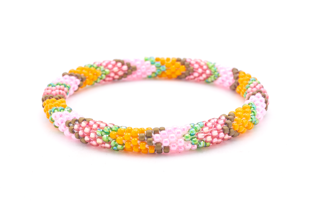 Sashka Co handmade beaded friendship bracelet with pink, rose red, orange, and green glass beads. Crafted in Nepal by skilled artisans.
 
 