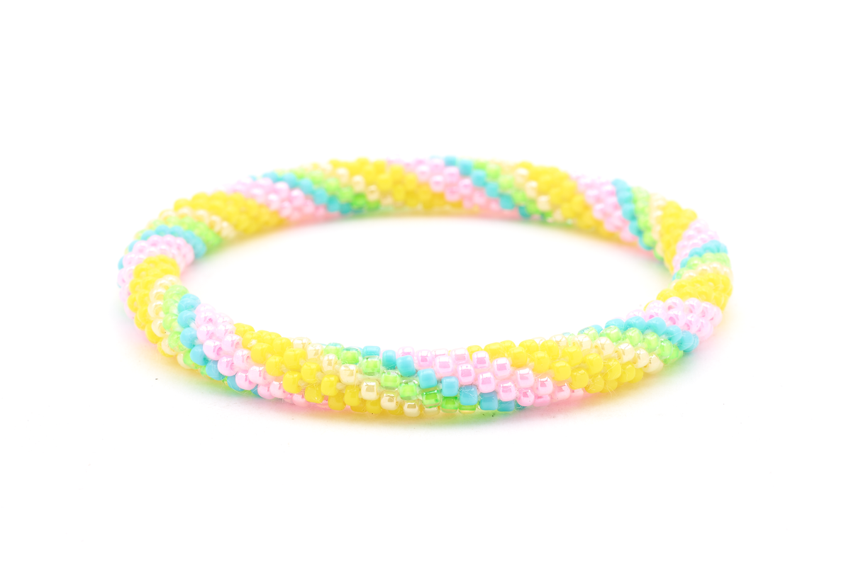 Handmade beaded friendship bracelet with yellow, pink, turquoise, green, and cream glass beads. Crafted by artisans in Nepal for Sashka Co.